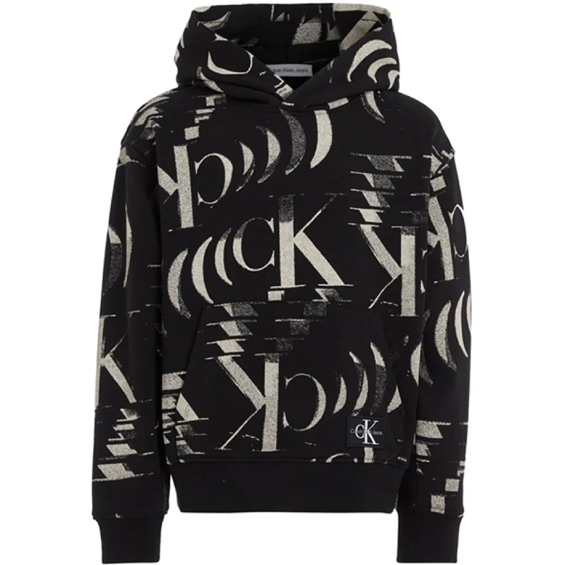 Women's graphic - printed sweatshirt featuring floral patterns for a feminine touchCalvin Klein Glitched Monogram Hoodie Aop Black Women's graphic - printed sweatshirt featuring floral patterns for a feminine touchCalvin Klein Glitched Monogram Hoodie Aop Black